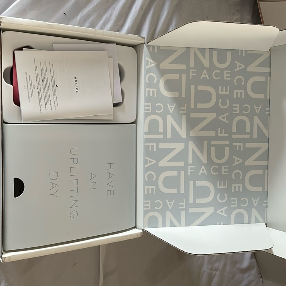 NUFACE facial and neck toning device